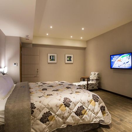 Verygood Business Hotel Huatan Номер фото